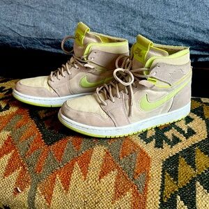 Nike Air Jordan’s tan and neon yellow size women’s 9.5